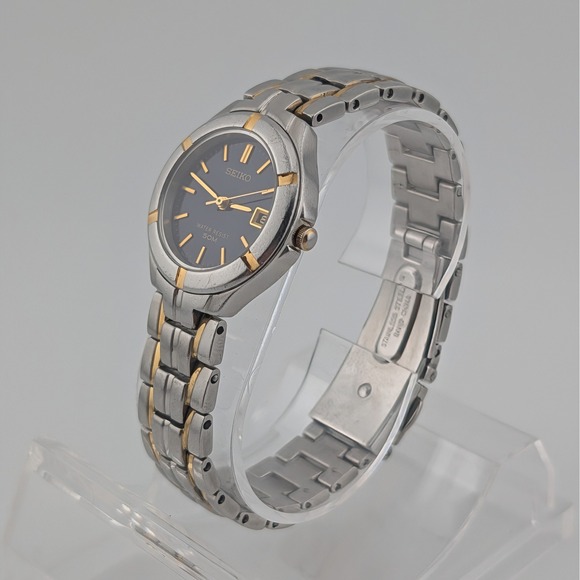 Seiko 7N82-0AG0 Blue Sunburst Two Tone Date Quartz Watch 50M